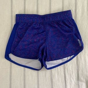 Blue athletic shorts.